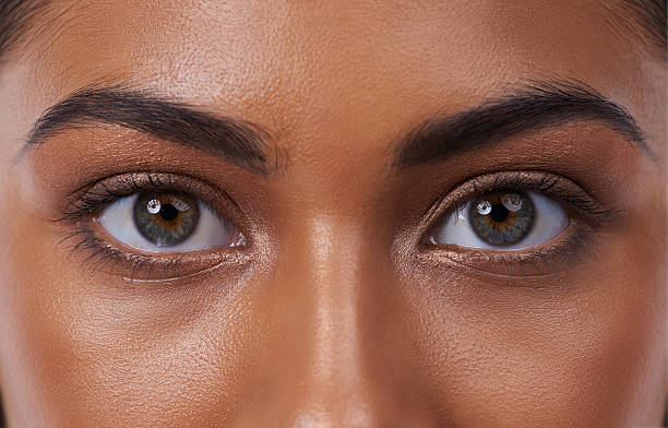 Closeup portrait of a beautiful young woman in the studio