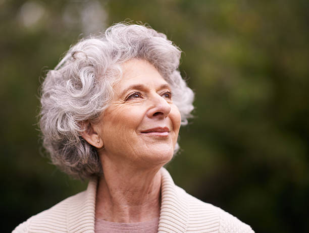 Cropped shot of a senior woman standing outside